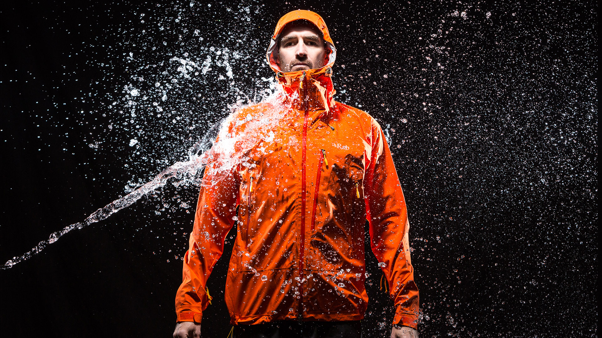Rab Firewall Jacket in simulated rain