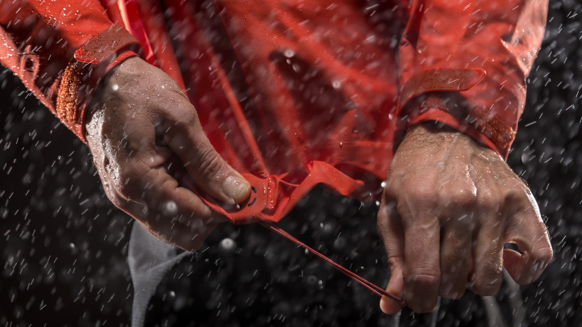 Black Diamond Helio Shell single-pull hem adjuster with Cohaesive cord-lock