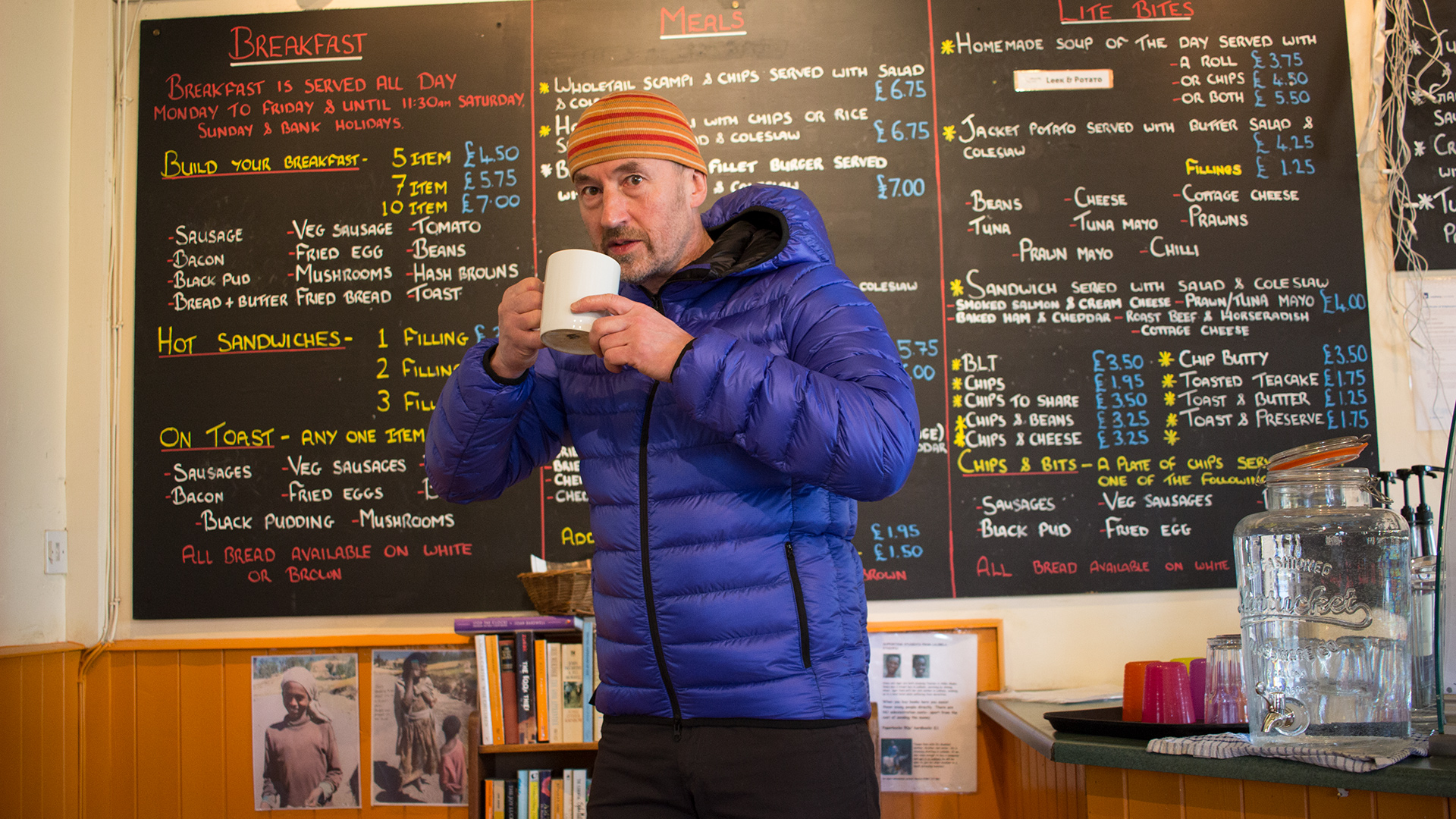 Criterion Activity Ultralight Down Jacket in the Outside cafe