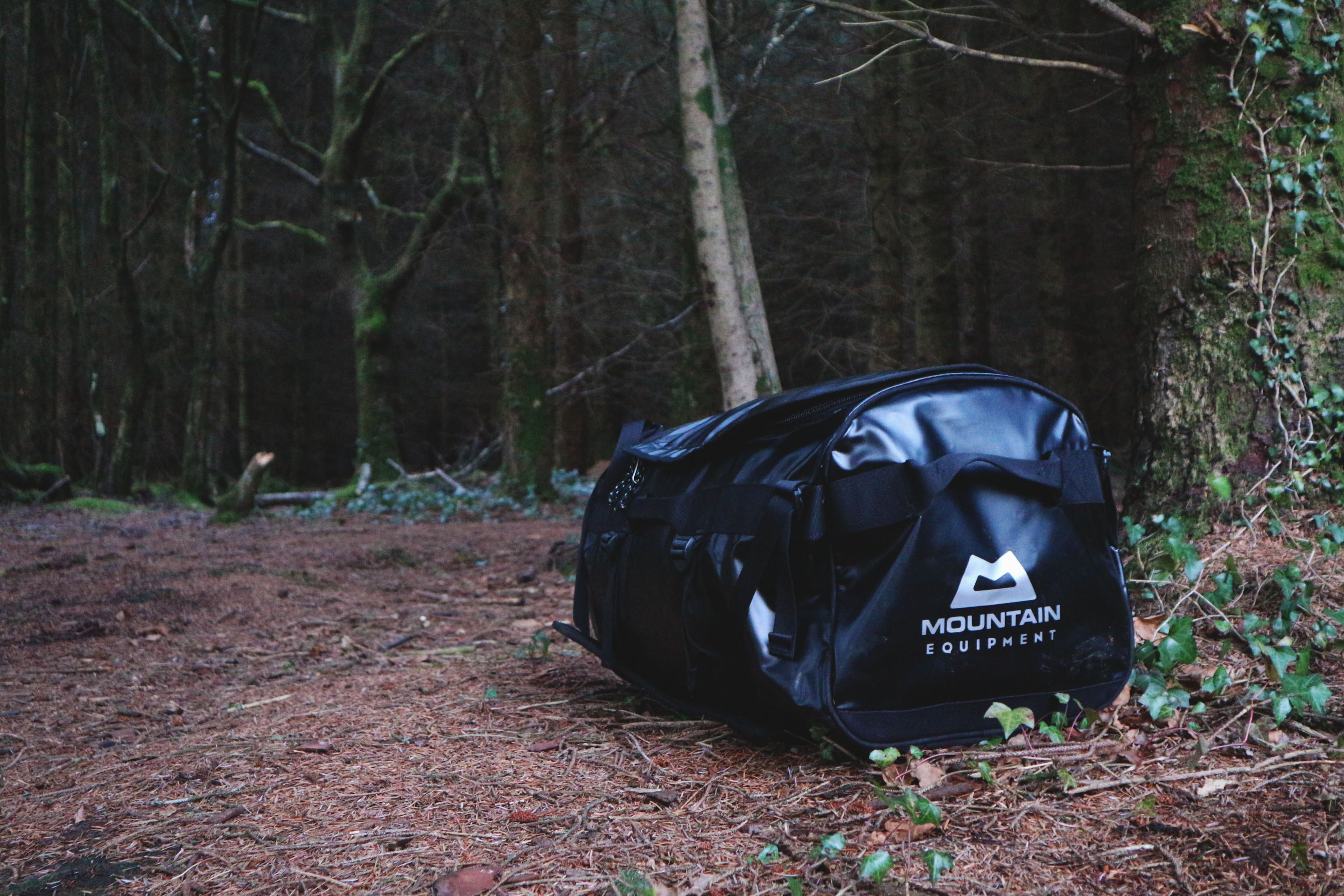 Mountain Equipment wet dry holdall showing waterproof construction and compartment organization